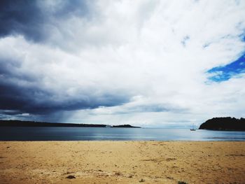 Scenic view of beach against sky