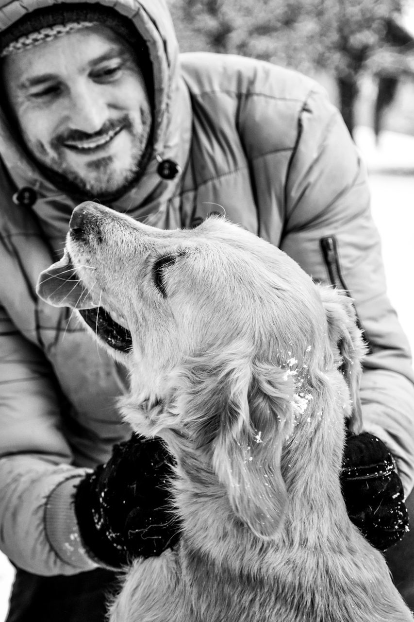 PORTRAIT OF MAN WITH DOG