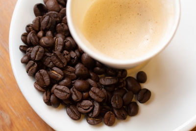 High angle view of coffee cup on table