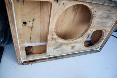 Close-up of wooden old speaker on table