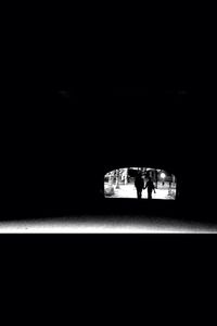 Close-up of woman in dark