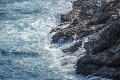 High angle view of waves in sea