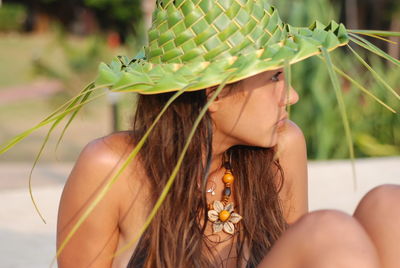 Close-up of woman wearing hat