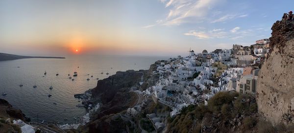 Panoramic view of beach against sky during sunset