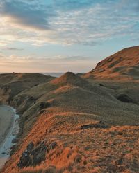Scenic view of landscape against sky during sunset