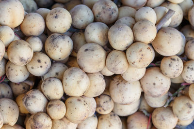 Full frame shot of onions for sale at market stall