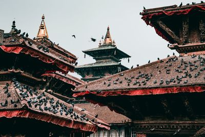 Low angle view of traditional building against clear sky