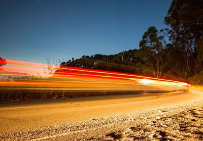 Light trails on road at night