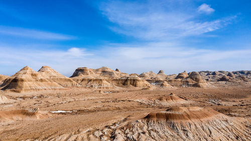 Rock formations on mountain against sky