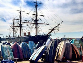 Boats moored at harbor