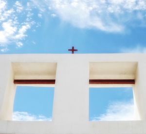 Low angle view of built structure against blue sky