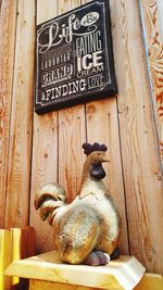 Lion sculpture on wood