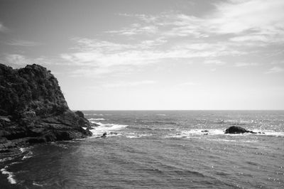 Scenic view of beach and sea against sky