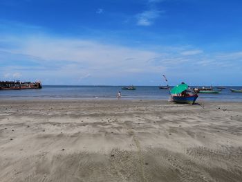 Scenic view of beach against sky