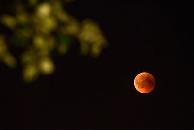 Scenic view of moon against sky at night