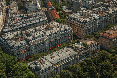 Detail of building in a sunny day seen from the eiffel tower in paris. the famous capital of france.