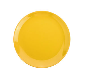 Directly above shot of yellow ceramic bowl on white background