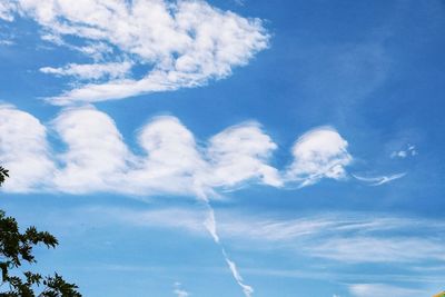 Low angle view of vapor trail in sky