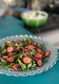 Close-up of fruits in plate on table