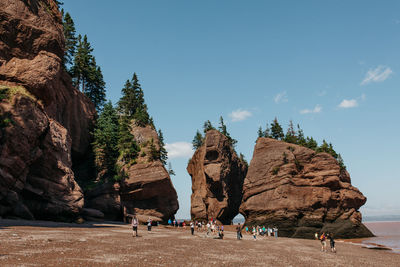 Scenic view of rock formations on beach