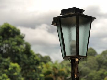 Low angle view of street light against sky