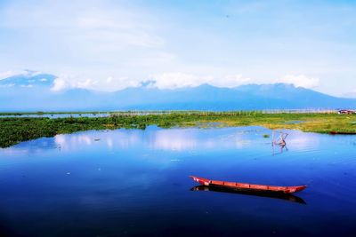 Scenic view of lake against sky