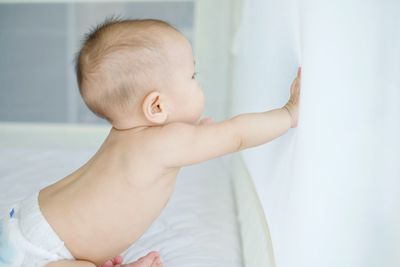 Portrait of cute baby at home