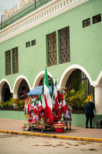 People in front of building