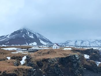 Scenic view of snowcapped mountain against sky