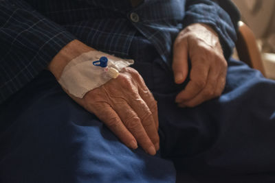 Close-up of hand holding hands