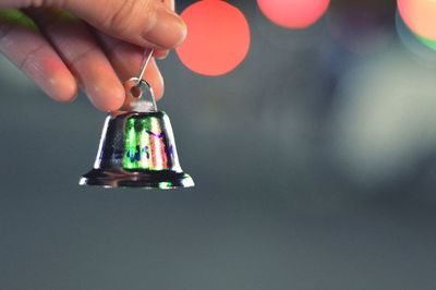 Close-up of hand holding christmas ornament