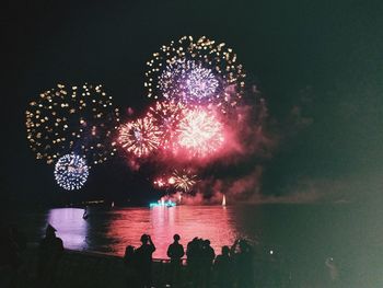 Firework display at night