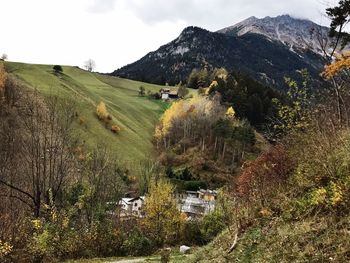 Scenic view of landscape and mountains against sky