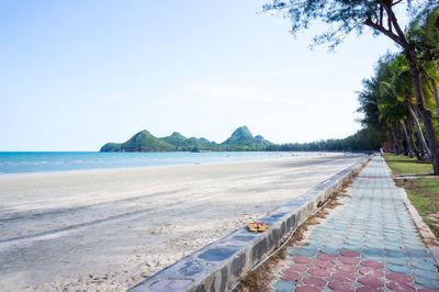 Scenic view of beach against clear sky