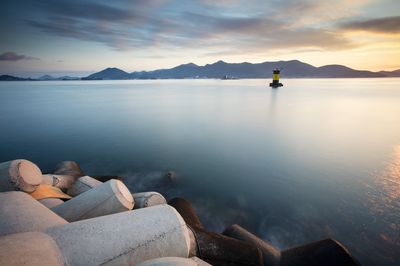 Scenic view of sea against sky during sunset