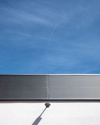 Low angle view of building against blue sky