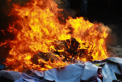 Close-up of fire burning on land