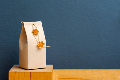 High angle view of stuffed toy on table against wall