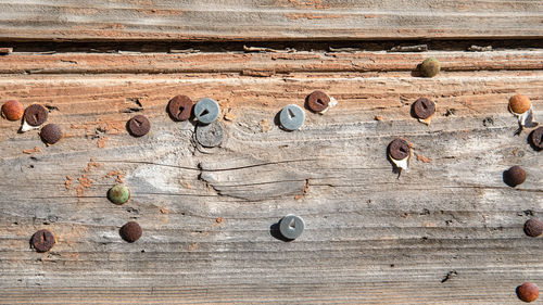 High angle view of rusty metal on table