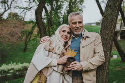 Portrait of smiling young couple