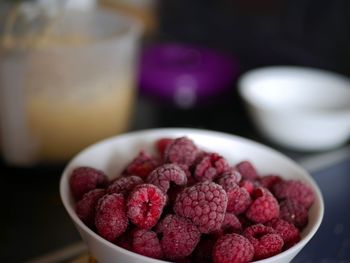 Close-up of strawberries in bowl on table