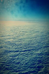 Scenic view of sea against blue sky