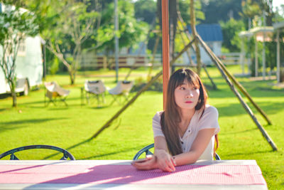 Young woman reading book