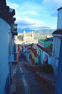 View of buildings against blue sky