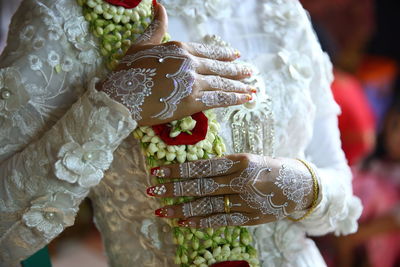 Henna is a hand painting worn by the bride when she is getting married