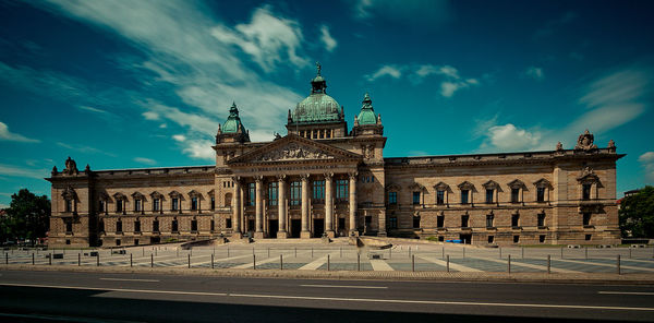 View of building against cloudy sky