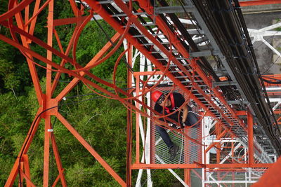 Engineer repairing rollercoaster