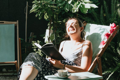 Young woman using digital tablet