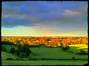 Scenic view of landscape against sky during sunset