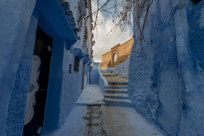 Footpath amidst buildings